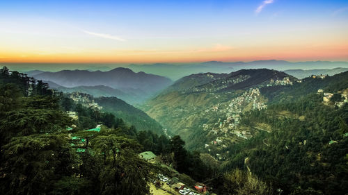 High angle view of mountains against sky during sunset