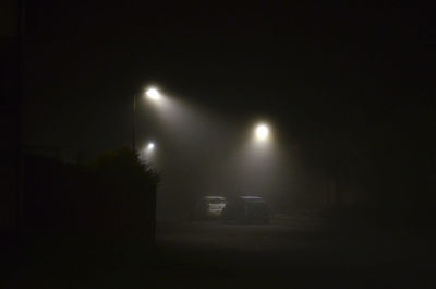 Illuminated street light at night