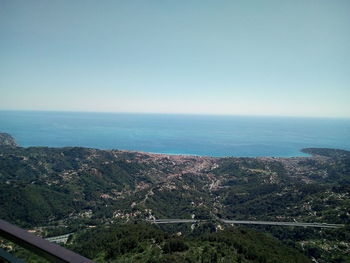 Scenic view of sea against clear blue sky