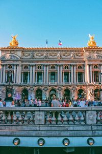 Group of people in front of building