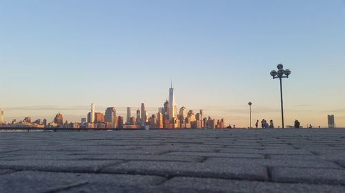 View of cityscape against blue sky