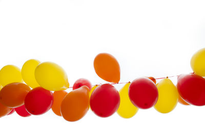 Balloons decorations against white background