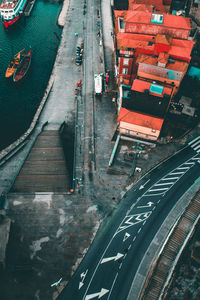 High angle view of railroad tracks on road in city