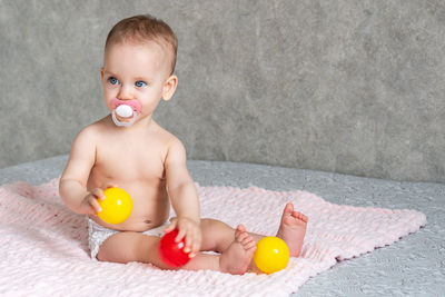 High angle view of cute girl playing with toy