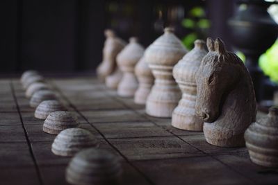 Close-up of chess pieces on chess board