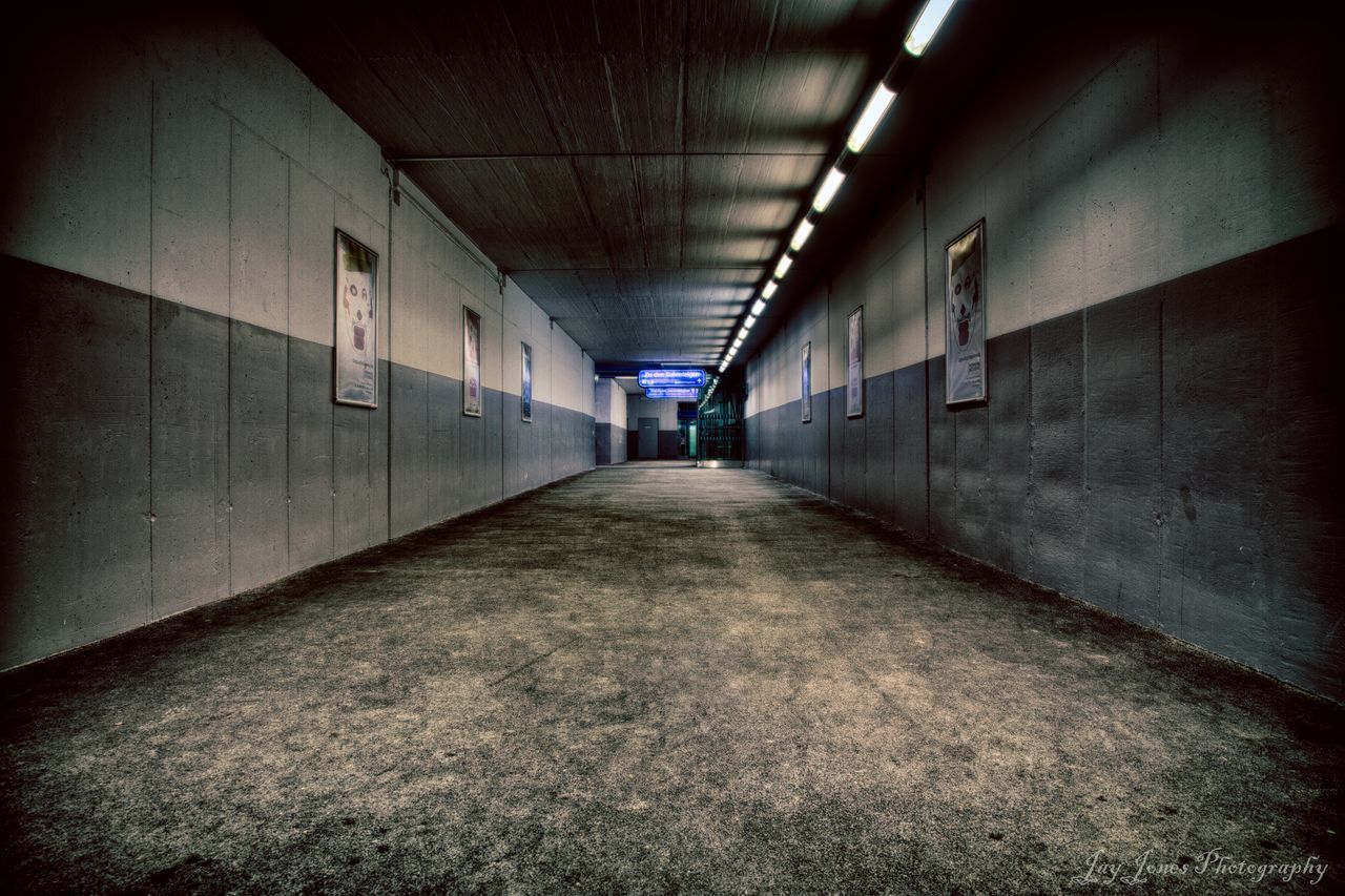 ILLUMINATED TUNNEL IN CORRIDOR