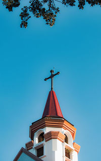 Low angle view of building against blue sky