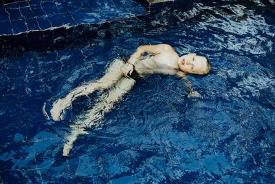 High angle view of stuffed toy in swimming pool