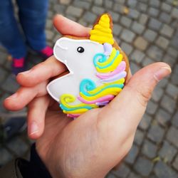 Close-up of hand holding toy