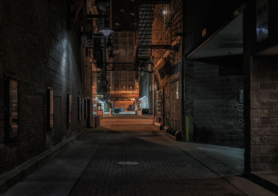 Illuminated corridor at night