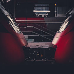 Close-up of train at illuminated railroad station