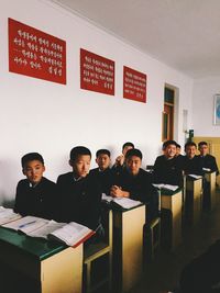 People standing in corridor