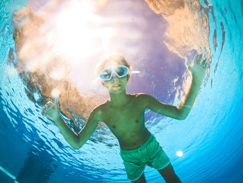 Portrait of boy in swimming pool