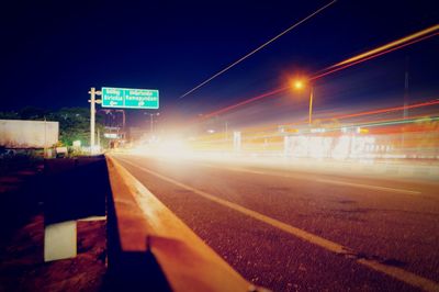 Traffic on city street at night