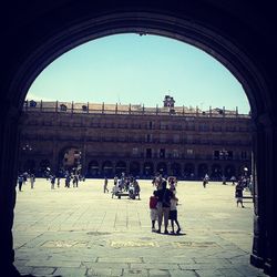 Tourists in front of building