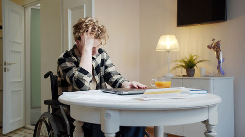 Woman sitting at home