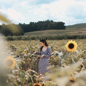 Woman standing on field