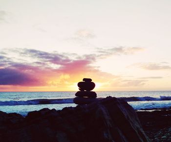 Scenic view of sea at sunset