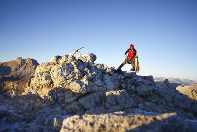 View of man mountain climing