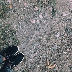 Low section of person standing outdoors