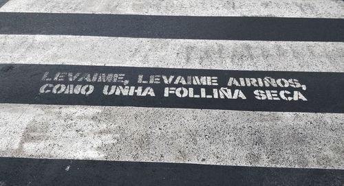 High angle view of text on road