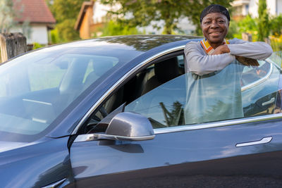 Side view of woman in car