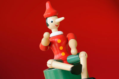 Close-up of toy against red background