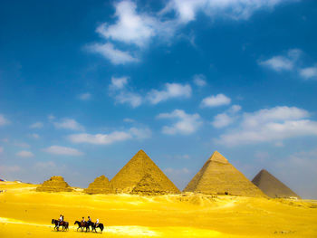 Low angle view of pyramids against sky