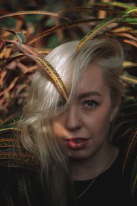 Close-up portrait of young woman with eyes closed