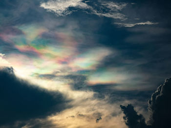 Low angle view of rainbow in sky