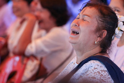 Close-up of senior woman crying