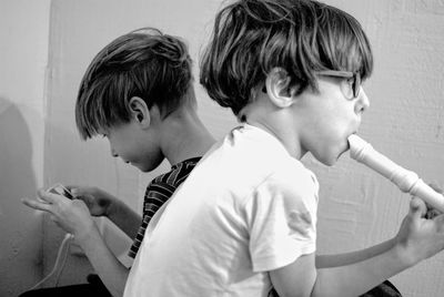 Close-up of boys playing at home