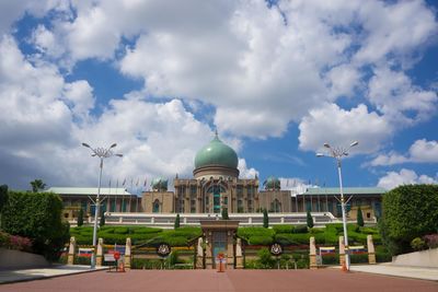 Building against cloudy sky