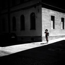 People walking on street in city