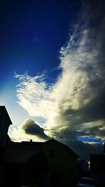 Low angle view of houses against sky