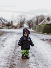 Rear view of boy in snow