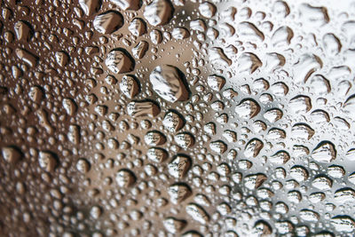 Full frame shot of water drops on metal