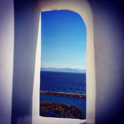 Scenic view of sea against blue sky