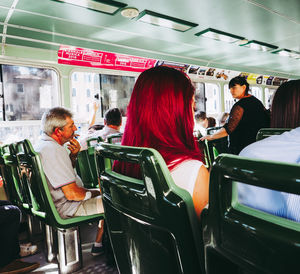 Rear view of people sitting in restaurant