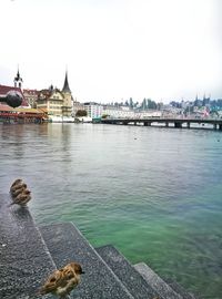 View of river with mosque in background