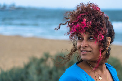 Portrait of a smiling young woman on beach