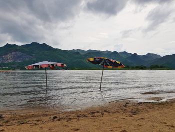 Scenic view of beach against sky