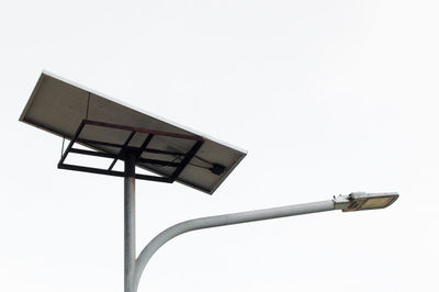 Low angle view of street light against clear sky