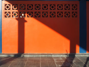 Close-up of orange wall in building