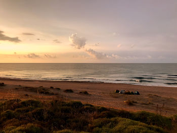 Scenic view of sea against sky during sunset