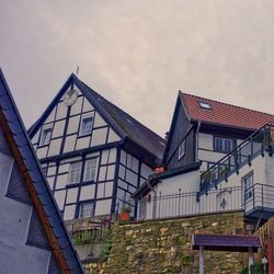 Low angle view of apartment against sky