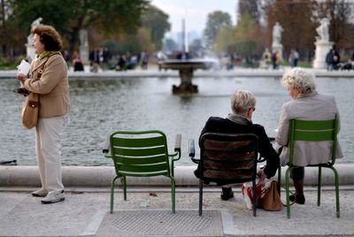 Rear view of woman looking at city