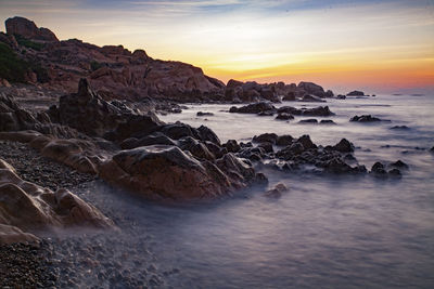 Scenic view of sea against sky during sunrise