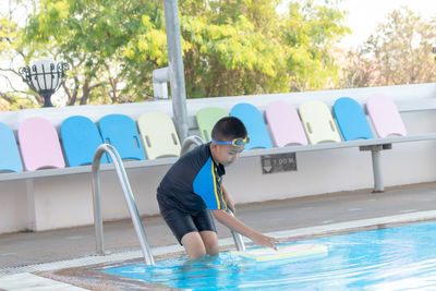 Boy in swimming pool