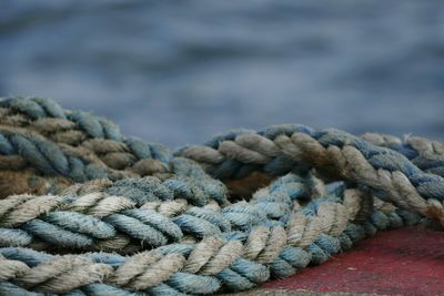 Close-up of rope on retaining wall